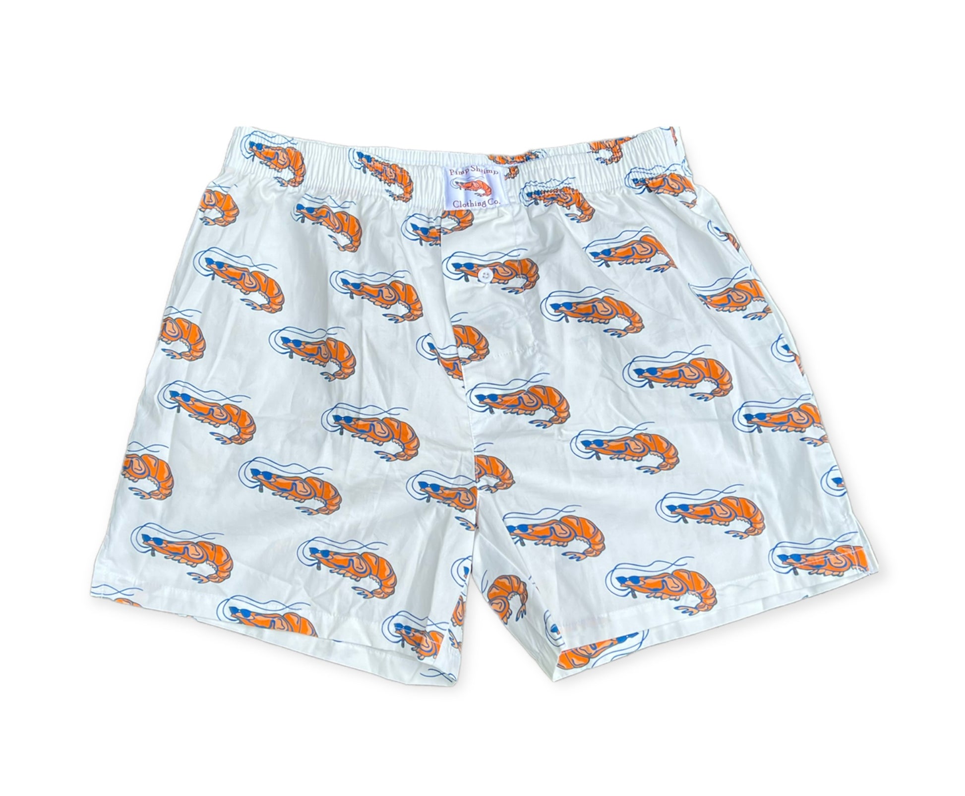 Image of Pimp Shrimp premium 100% woven cotton boxer shorts! Super comfortable, cool, and great looking! Our elastic waistband is a bit wider for comfort, and long lasting. The button fly has a clean look along with the v-groove and 4" inseam. MUCH thought went into making a traditional looking boxer, while offering something fresh, versatile, great looking and in keeping with the Pimp Shrimp brand. White boxers with the pimp shrimp logo. 